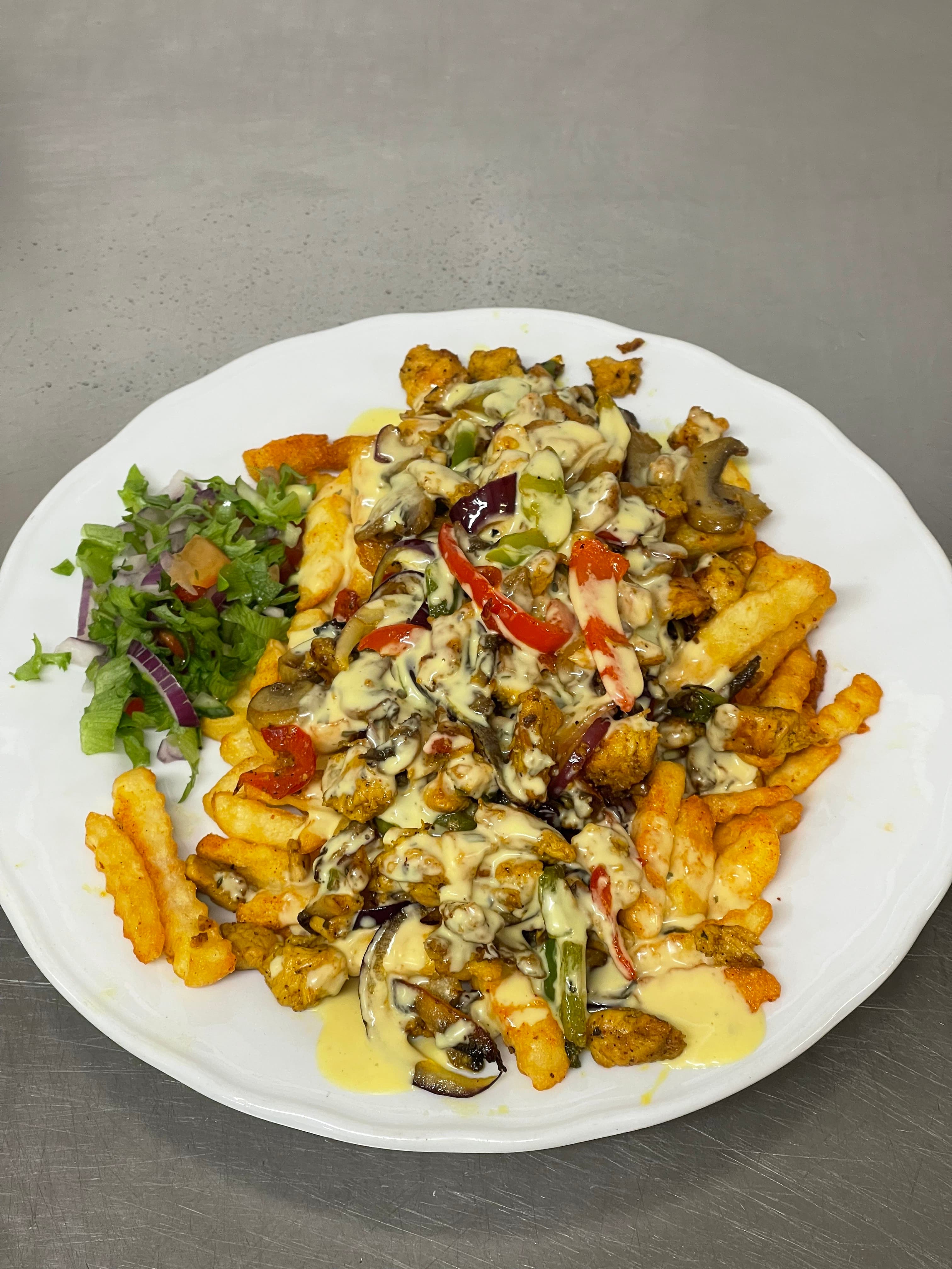 Kylling med kremsaus og pommes frites